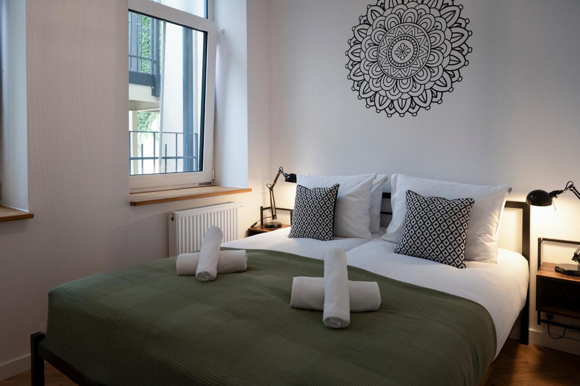 Tyzenhauz Apartments Siemiradzkiego Street Krakau Buitenkant foto
